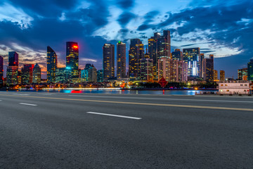 City skyscrapers and road asphalt pavement