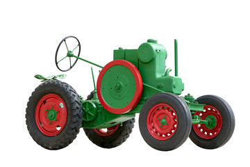 Historically green tractor, isolated on a white background. Retro tractor in a perfect technical condition.