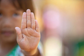 Stop harassment child and stop violence abuse in child. Hand stop no.