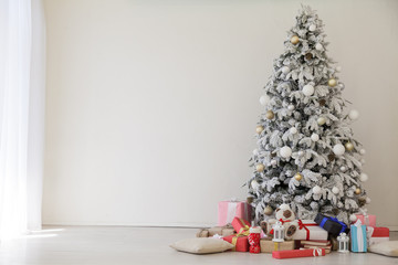Christmas tree with presents, lights new year winter holidays