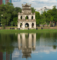 Fototapeta premium Turtle Tower (Thap Rua) in Hoan Kiem lake (Sword lake, Ho Guom) in Hanoi, Vietnam.