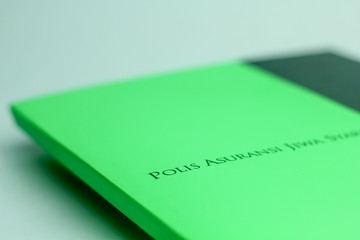 Insurance Policy Manual (Buku Polis Asuransi) Isolated on a White Background
