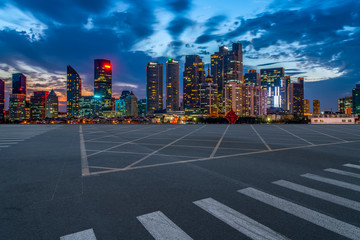 City skyscrapers and road asphalt pavement