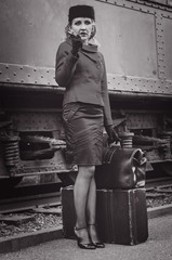 Retro woman on the train station