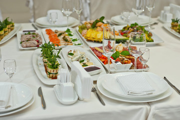 delicious dishes on the table in the restaurant. serving table.
