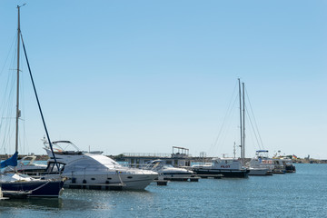 Fototapeta premium Mangalia, Constanta, Romania - July 7, 2017: boats anchored at the Mangalia's harbor in Romania, Europe.