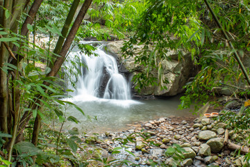 Waterfall flowing from the mountains at Phu SOI DAO waterfall in Loei ,Thailand.