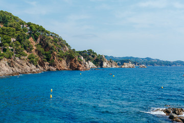 Fototapeta na wymiar Beautiful Mediterranean sea coast with turquoise water near Blanes, Costa Brava, Catalonia, Spain. Summer landscape