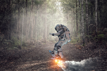 Spaceman on flying board. Mixed media