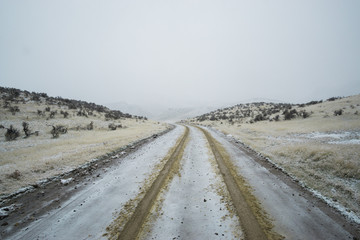 Snowy road in winter, Owyhees, Eastern Oregon, USA