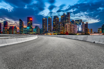 City skyscrapers and road asphalt pavement