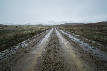 Wet dirt road through the desert in Eastern Oregon, USA