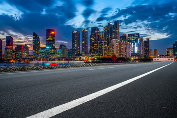 City skyscrapers and road asphalt pavement