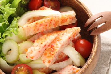 pan fried crab cake on celery salad