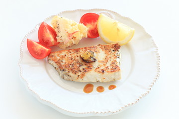 Homemade sword fish fillet sauteed with mango sauce