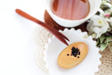 Fototapeta na wymiar Japanese food, sweet potato and sesame cake