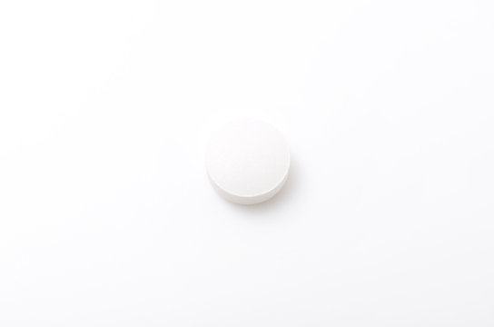 白い錠剤（サプリメント）
