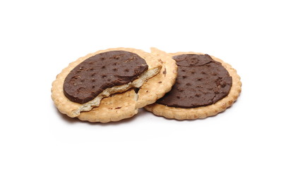 Chocolate cookies with crumbs isolated on white background
