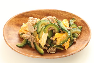 Chinese food, bitter melon and pork stir fried with egg