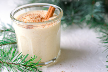 Eggnog, Traditional Christmas Drink, Cocktail with Cinnamon and Nutmeg for Winter Holidays
