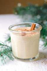 Eggnog, Traditional Christmas Drink, Cocktail with Cinnamon and Nutmeg for Winter Holidays