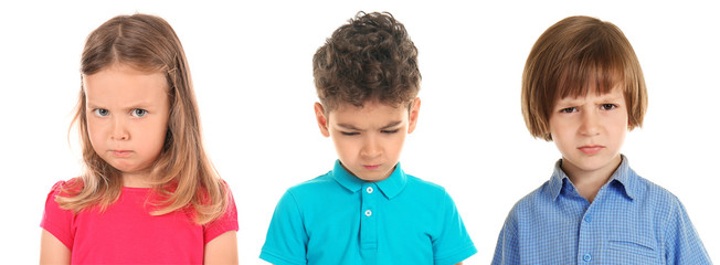Surprised little boy on white background