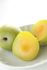 Freshness green plum from Japan on white background