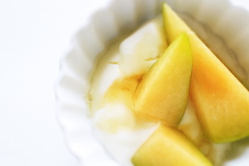 Sweetness Japanese melon and honey on yogurt