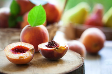 fresh peaches on a wooden table