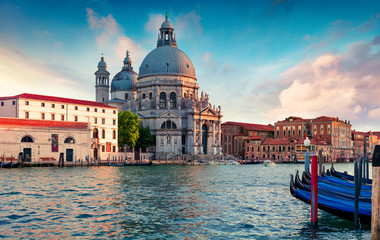 Great evening view of Grand Canal and Santa Maria della Salute Church. Colorful spring sunset in...