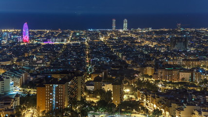 View of Barcelona timelapse, the Mediterranean sea, The tower Agbar and The twin towers from Bunkers Carmel. Catalonia, Spain.