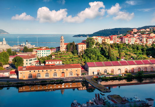 Aerial spring view of Marola village. Picturesque morning seascape of Mediterranean sea, La Spezia location, Italy, Europe. Traveling concept background.