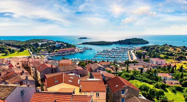 Aerial view of the port of Vrsar (Orsera) town. Colorful spring cityscape of Croatia, Europe. Traveling concept background. Magnificent Mediterranean seascape.
