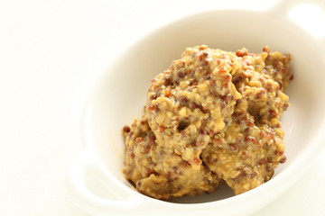 Mustard sauce on white background