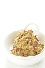 Mustard sauce on white background