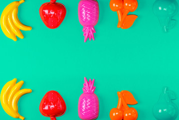 Obraz na płótnie Canvas multicolored plastic toys fruits