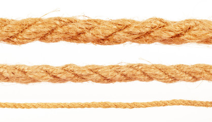 collection of various ropes string on white background. each one is shot separately