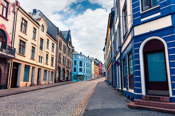 Fototapeta na wymiar Colorful cityscape of port town Alesund, known for the art nouveau architectural style. Splendid summer scene in Norway, Europe. Artistic style post processed photo.