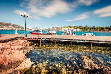 Splendid spring scene of the Porto Rafti port. Sunny morning seascape of Aegean sea, Greece. Traveling concept background.