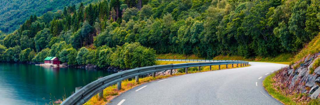 Colorful summer scene of Hjorundfjorden fjord, Orsta municipality, More og Romsdal county. Colorful morning panorama of Norway. Traveling concept background.