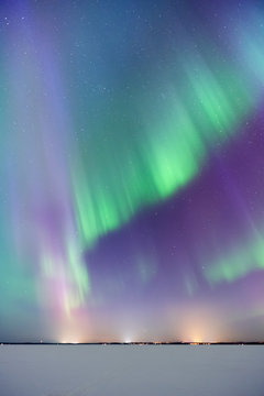 Aurora Borealis, Northern Lights, above frozen lake