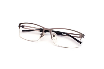 Beautiful metallic grey sunglasses with a thin frame isolated on white