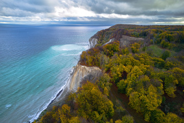Aerial view of white chalk cliff in autumn colors
