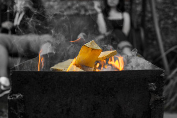 Colored fire on black and white background