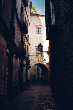 Gothic quarter street and Catalan flag