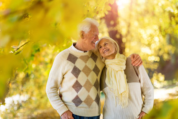 Senior couple in autumn park