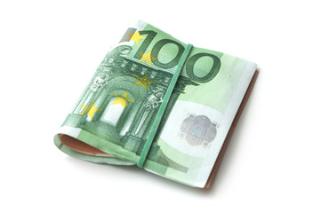 Obraz na płótnie Canvas closeup of banknotes bundle of hundred euros money on white background