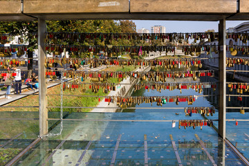 Fototapeta na wymiar Love locks on Butcher's bridge in Ljubljana, Slovenia 