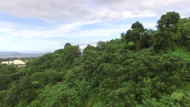 Los Ba&ntilde;os, Laguna, Philippines - November 21, 2017: Mountain rainforest modern housing built. Drone Aerial