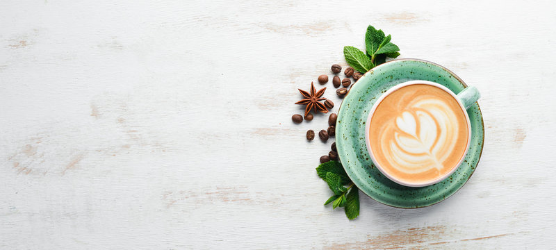 Cappuccino. Coffee With Milk. On A White Wooden Background. Top View. Free Copy Space.